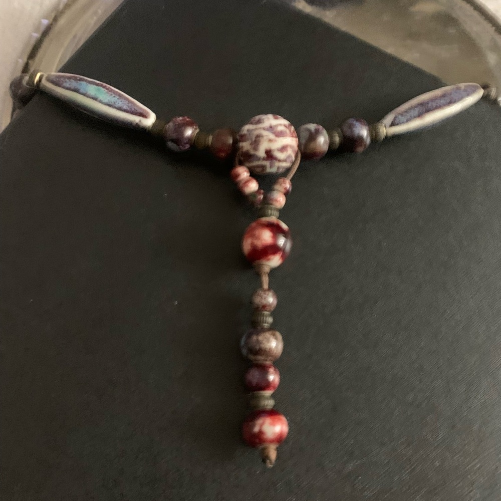 Red and Brown Necklace with Central Focal Point and Elongated Beads